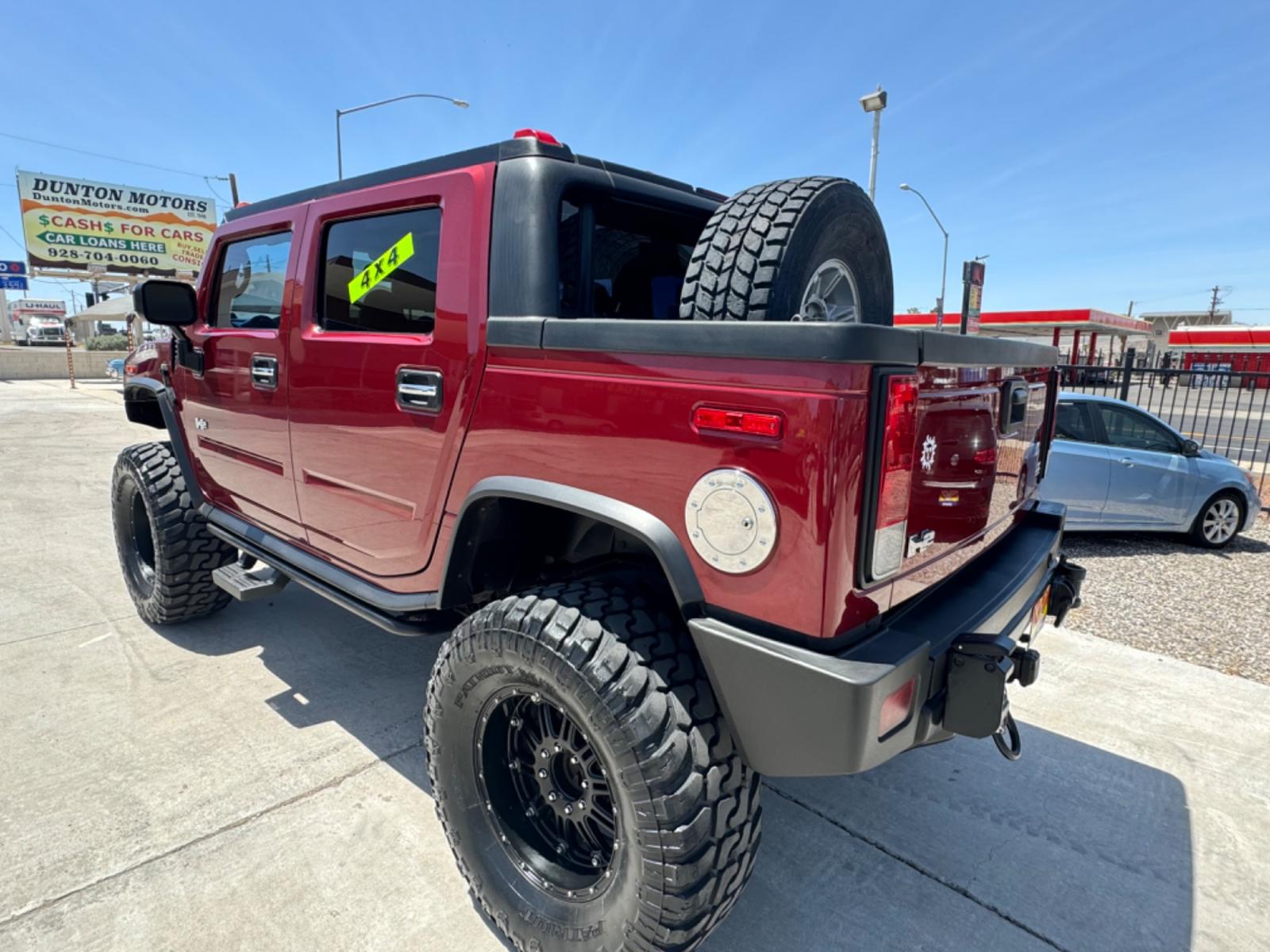 2005 Red /black Hummer H2 SUT , located at 2190 Hwy 95, Bullhead City, AZ, 86442, (928) 704-0060, 0.000000, 0.000000 - 2005 Hummer H2 SUT. only 92k miles. 6.0 V8 4 wheel drive. New transmission with warranty. New shocks. lots of extras .onstar. backup camera, custom stereo. fabtech 6 in lift with 40 in tires. Big Bad Hummer. $22900. Free and clear title. - Photo #12
